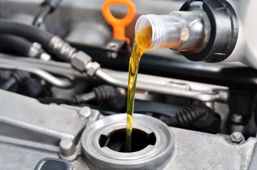 expert changing oil during Auto Repair Ft. Lauderdale FL