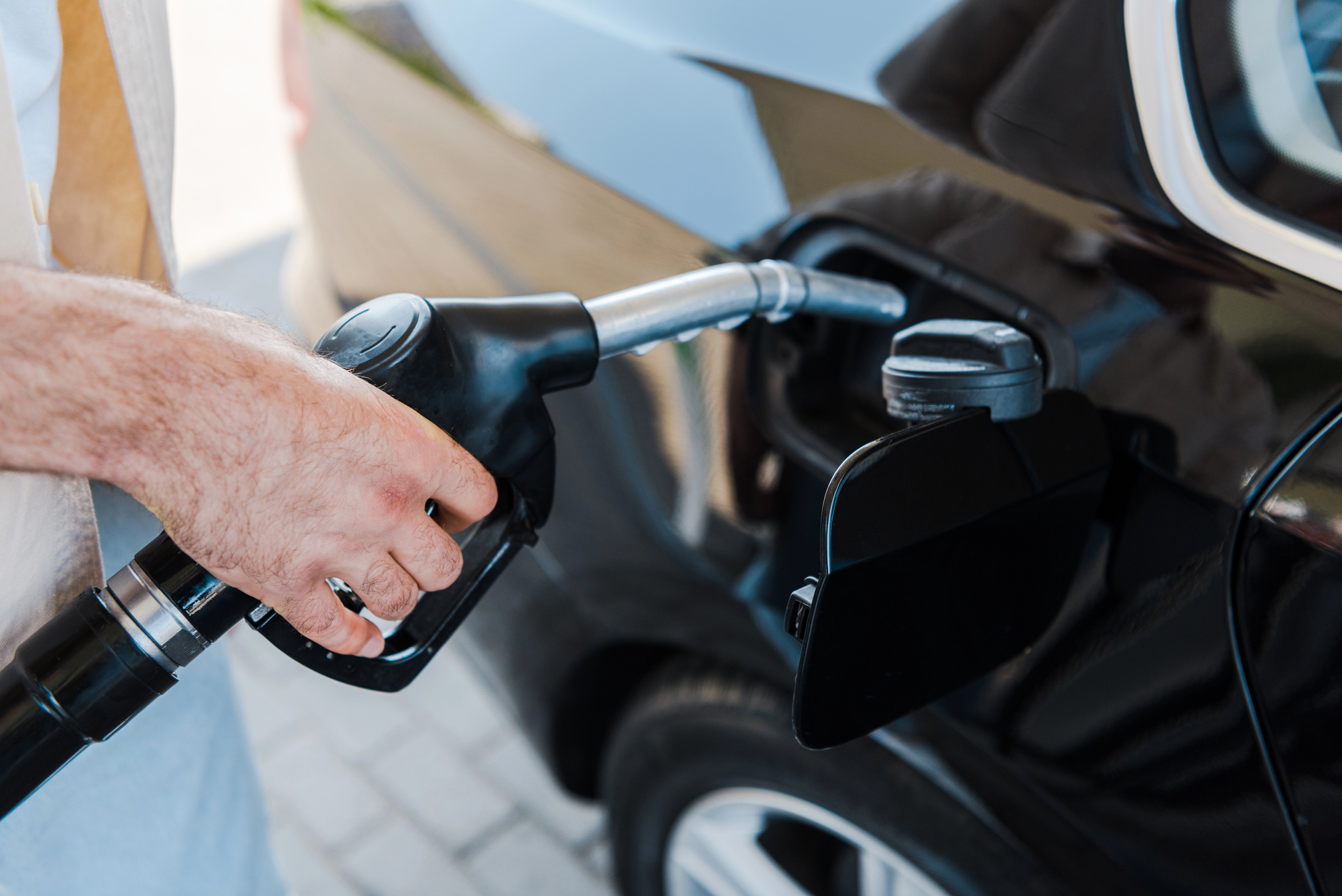 black Volkswagen getting fuel after Volkswagen repair in davie fl