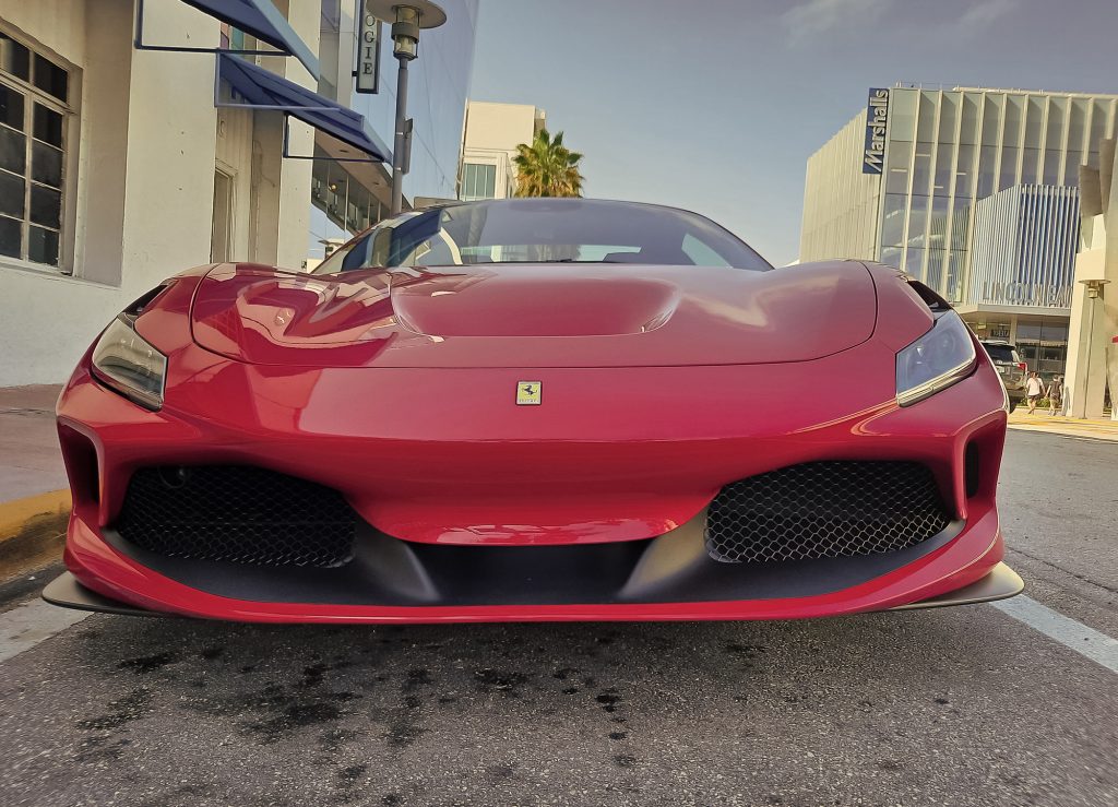 Los Angeles, California USA - March 24, 2021: red Ferrari F8 Tributo luxury sport car low front view